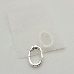 Tiffany & Co Sterling Silver Oval Clasping Link Spring Jump Ring Charm Pendant